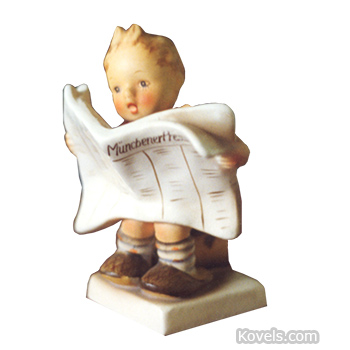 hummel boy reading newspaper